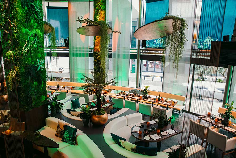 The cascading foliage in AMICI Stuttgart is a slight nod towards the nature of Asia