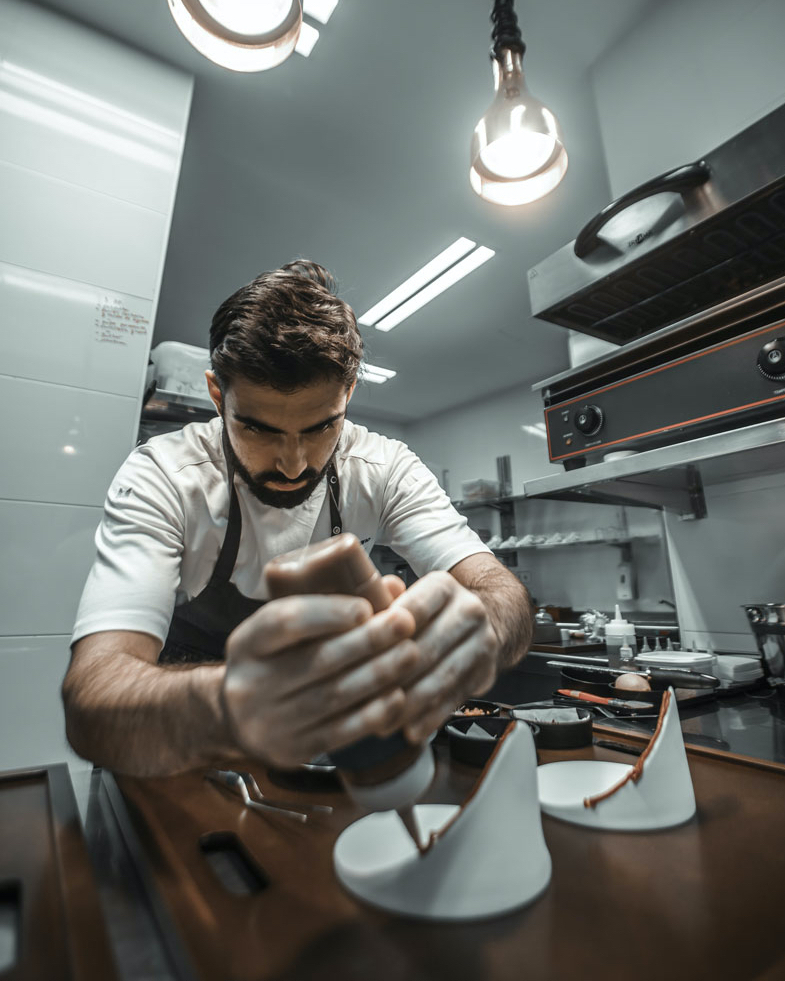 Alejandro Serrano preparing meal